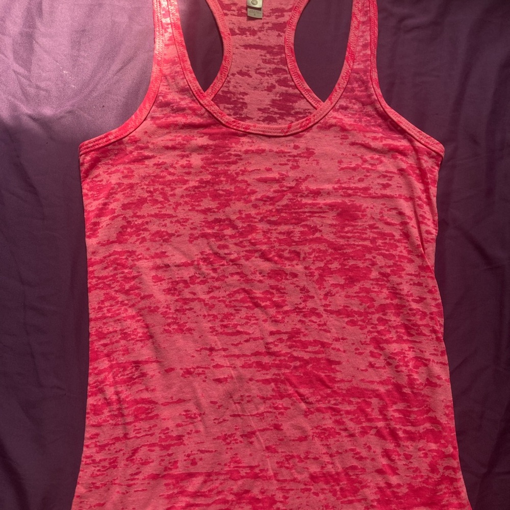 Pink Next Level Burnout Racerback Tank Top. Available in sizes S-2XL